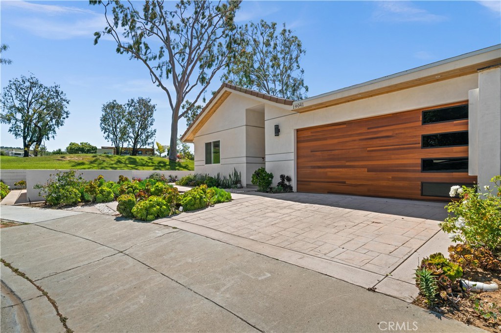 Elegantly fully furnished Turtle Rock modern beauty with an unbelievable view, located near award winning schools! Complete serenity awaits you in this meticulously newly renovated home. A highly desired single story model boasts an open, spacious, natural lighted floor plan, with 4 bedrooms, 3.5 baths, including a private junior suite. Outside, a beautiful, low maintenance space overlooks stunning green landscapes. A 28 foot sliding door allows for that California dream of indoor/outdoor living to be enjoyed year round. Inside, high ceilings, Italian floor tiles, new energy efficient appliances, Quartz waterfall kitchen island and separate pantry for extra storage make for a truly magnificent gourmet kitchen. New energy efficient lighting and plumbing throughout make for a turn-key, inviting, yet sophisticated space to enjoy. Moreover, amenities that are steps away include tennis and basketball courts, gated swimming pool, and lush greenery to enjoy morning, afternoon, and evening walks.