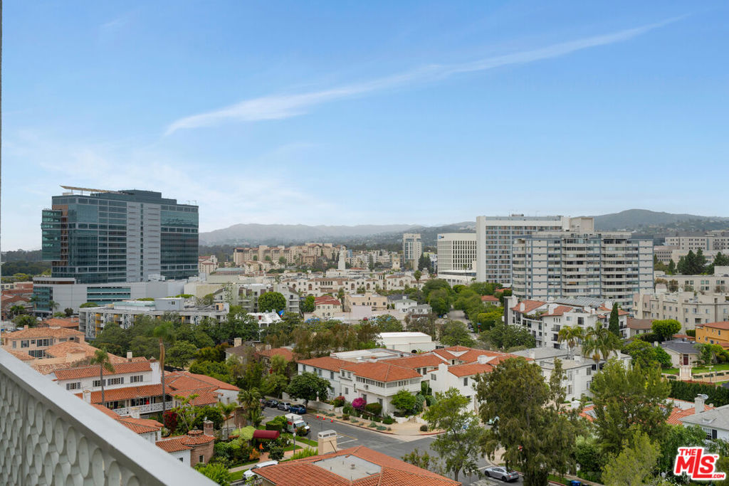 Enjoy a stunning unobstructed 180 degree view form this updated 10th floor 3-bedrrom, 3-bathroom residence, free from the traffic noise of Wilshire Boulevard. The residence is bathed in natural light, enhancing the expansive living and dining areas that seamlessly connect to a large balcony, creating an exceptional indoor and out-door flow. The updated kitchen is equipped with custom cabinetry, granite countertops, and stainless steel appliances. A convenient breakfast bar adds to the kitchen's appeal. The generous primary bedroom features a large walk-in closet and an ensuite bathroom for maximum comfort. The second bedroom offers a sizeable wall closet, while the third ensuite bedroom, located near the kitchen is perfect for use as a guest suite or a home office. Enjoy the ease of having an in-unit washer and dryer. The building provides 24-hour valet, doorman and concierge services. Homeowners association dues covers all utilities except cable and internet. Additional amenities include individual storage space in the garage area. The residence is ideally located near UCLA, 405 freeway, Century City, Westwood village, and Beverly Hills. Residents have immediate access to premier shopping, dinning and entertainment options, making this an outstanding place to call home.