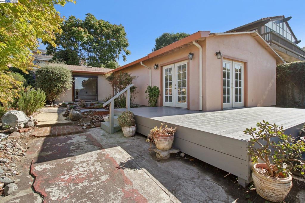 Welcome to this Charming and Warm 3-bedroom, 1-bath + A Huge Family Room Single-Level Home nestled in one of the most peaceful neighborhoods-Hillcrest Knolls. Step inside to find a bright, spacious living room with large windows that fill the space with natural light. The open dining area flows seamlessly into the kitchen, creating the perfect setting for everyday living and family gatherings. Freshly painted interior, new appliances, new decks. Great layout with lots of potentials. The oversized Family Room perfect for entertainments or converting to a master suite/working office/studio. The private backyard decks provide the perfect backdrop for summer BBQs, morning coffee, or peaceful evenings under the trees. Large backyard, this property offers endless outdoor possibilities — garden, play, entertain, or even build an ADU. 3 parking spaces, and convenient access to BART, 580/880 freeways, and nearby parks, this home combines comfort, convenience, and value — all in one. Whether you’re a first-time buyer or investor, this is an excellent opportunity to make your move in San Leandro!