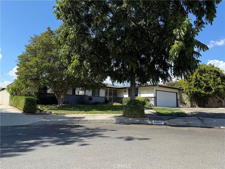 In North Ontario, at the end of a cul-de-sac among other beautiful custom built homes with large lot sizes. you will arrive at this lovely pool home with RV parking. This oversized lot boasts 13,200 sq.ft. Once inside you will notice many upgrades that include new flooring quartz counters, updated bathrooms, and 4 spacious bedrooms. Exterior features plenty of parking including over 75 ft for RV with an Iron security gate, a large sparkling pool with new pump and filter, large covered patio area, custom sheds for extra storage and low maintenance backyard. Speaking of maintenance, seller has installed a new water heater, new mainline with clean out, commercial laminate flooring, carpet, recessed lighting, washer and dryer hookups in laundry room and garage and too many to mention here.  

No HOA, close to shopping and easy freeway access.