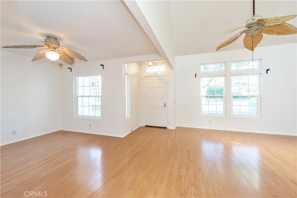 This beautiful townhome in the Cambridge Court community is conveniently located near UC-Irvine and the highly coveted University High School. It features Two bedrooms, Two & Half bathrooms, and attached 2-car garage with laundry hookups and ample storage space. Step inside to discover a bright and airy living area, with new luxury vinyl floors in upstairs that flow seamlessly from room to room. The kitchen opens to the family room. A cozy fireplace separates the living and dining rooms, High ceiling creating distinct spaces for relaxation and entertaining. The homeowner association offers a peaceful environment with lush landscaping, a swimming pool, BBQ area, basketball court, and playground. Within walking distance to popular stores like Trader Joe’s and Target, as well as world-class dining. Don’t miss the chance to make this charming townhouse your home!