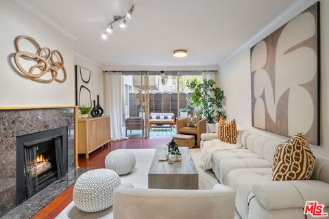 Photo of 1745 Camino Palmero Street #104, Los Angeles, CA 90046 (MLS # 26648449)