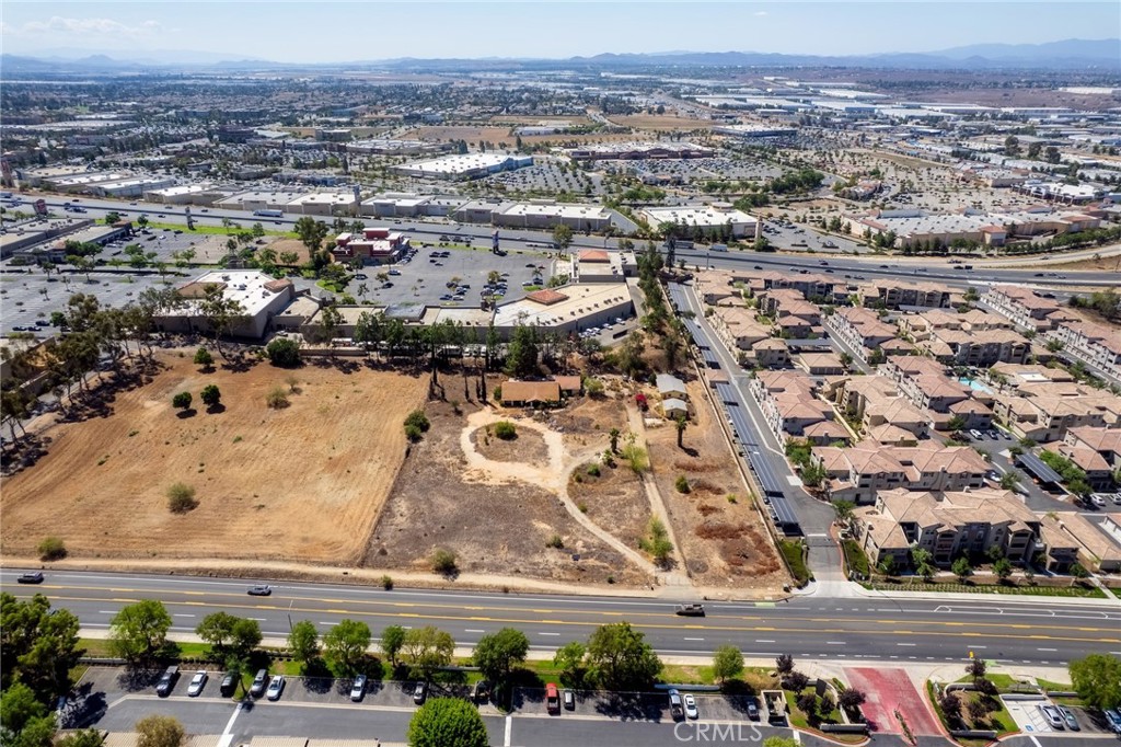 Seize this exceptional investment opportunity in the heart of Moreno Valley’s rapidly developing commercial corridor! This expansive 2.86-acre parcel is zoned for commercial use, offering a blank canvas for visionary investors and developers. Situated at 21665 Box Springs Rd, this property boasts prime accessibility, with excellent proximity to major roads, nearby shopping, and a surge of new multi-family residential developments surrounding the area.
Property is being sold for land value only, the property features two existing structures, including a 6-bedroom, 4-bathroom home built in 1978, predating Moreno Valley’s establishment as a city. Please note, per city regulations, the home is zoned strictly for commercial use only, presenting a unique opportunity for adaptive reuse or redevelopment. With existing power and water utilities already in place, this site is primed for your next commercial venture. Don’t miss this rare chance to secure a high-potential commercial property in a booming area! For more details or to discuss development possibilities, please contact the listing agent today.