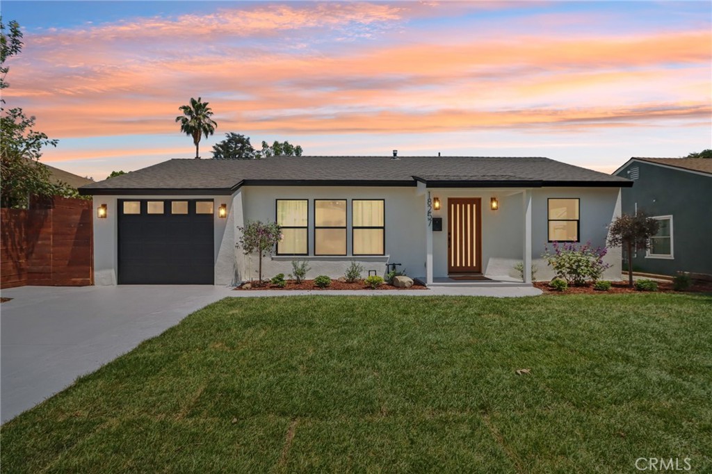 Fully Remodeled South of the Blvd Pool Home! Welcome to 18257 Palora Street – a beautifully updated pool home located in one of the most desirable neighborhoods in the San Fernando Valley. Completely remodeled throughout, this home features a brand-new roof, upgraded electrical panel, new HVAC, new gas water heater, and all-new interior and exterior doors. Inside, you’ll find luxury flooring, a modern open-concept chef’s kitchen with quartz countertops, new cabinetry, and stainless-steel appliances. The spacious primary bedroom includes an upgraded en-suite bath and a walk-in closet, while two additional bedrooms share an upgraded bathroom. A bonus room offers the perfect space for a home office, studio, or playroom. A new laundry area has been added inside the home for added convenience. Step outside to a beautifully landscaped backyard with a classic 10,000-gallon deep pool, resurfaced and equipped with updated systems - ideal for relaxing or entertaining. Located just minutes from The Village, El Caballero Country Club, Nestle Avenue Charter Elementary, and top dining spots, this is the perfect opportunity to own a move-in ready home in prime Tarzana.