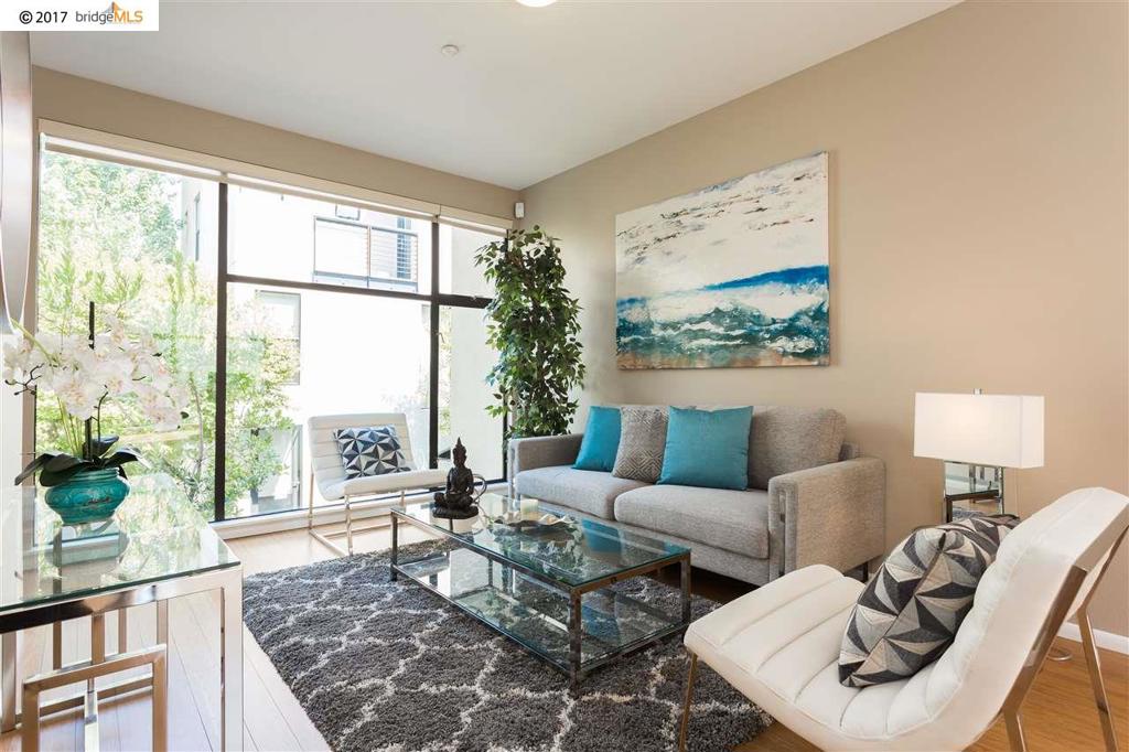 Rarely available and highly sought-after townhouse in City Limits. This spacious tri-level home has large windows which highlight two levels of living above its side-by-side, two-car garage with a laundry area & storage space. The second floor has an open kitchen, living and dining areas, plus a half bath. The kitchen features maple cabinets, granite countertops, and stainless steel appliances including a gas range. Two bedrooms, each with en-suite baths, are on the third floor. There's even a charming balcony off of one of the bedrooms. Built by Pulte Homes in 2005. Just about everywhere in the Bay Area is easily accessible thanks to the Emery Go-round, a free shuttle that stops at 66th and Hollis, only a couple of blocks from City Limits, and takes riders to the MacArthur BART station. If you’re looking for the perfect place to call home in the heart of the East Bay you’ve found it here at City Limits.