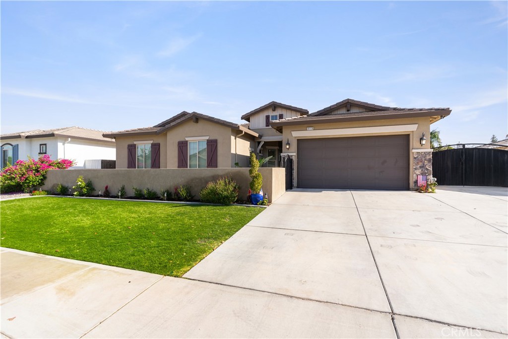 Opportunity knocks with this beautiful split wing home located in Monticello in NW Bakersfield. This beautiful 4 bedroom 2.5 bath home features a large great room plan with separate formal dining, a large open kitchen with granite counter tops and stainless appliances, a large walk-in pantry, updated pendant lighting and tons of storage. The large living-room features built in storage, a gas fireplace and large windows that look out on the tastefully landscaped back yard. The bedrooms are nice and large with ceiling fans and large closets. The primary suite features ceiling fans, large windows that look out on the back yard, a large private bath with granite counter tops, separate tub and shower and a huge closet. There is a private courtyard and a large paved RV parking area with a clean out. Don't wait to see this one or it will be gone.