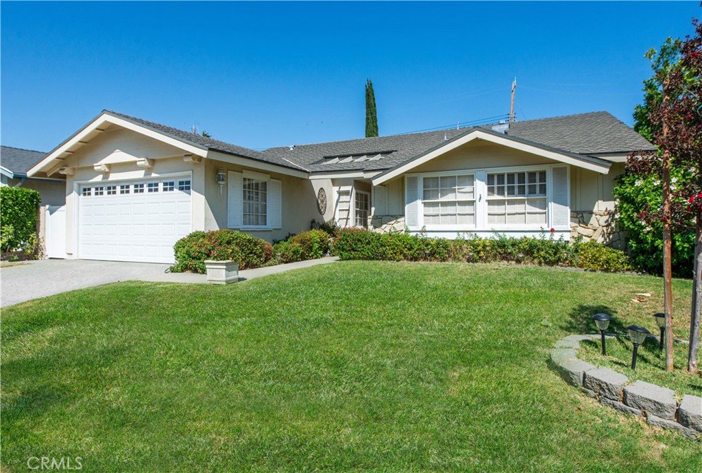 Location, Location, Location!
Welcome to this charming single-story 4-bedroom, 2-bathroom home, ideally situated in a prime location in Chatsworth near parks, hiking trails, restaurants, shopping, the Porter Ranch Vineyards, and easy access to the 118 Freeway.
Step inside to find a spacious layout that includes a formal living room and a separate family room—perfect for both relaxing and entertaining. The large kitchen features an eat-in dining area plus a formal dining room, offering plenty of space for gatherings.
Additional highlights include copper plumbing, a newer roof, a newer electrical panel, a newer dishwasher, and direct access to a 2-car garage with ample storage and direct access.
This is a fantastic opportunity to own a well-maintained home in a highly sought-after neighborhood. Don’t miss out—schedule your private showing today and let’s open escrow!