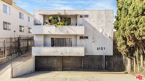 Photo of 3121 S Canfield Avenue, Los Angeles, CA 90034 (MLS # 26647857)