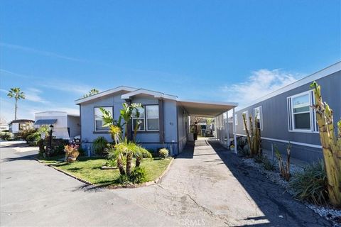 Photo of 32900 Riverside Drive #63, Lake Elsinore, CA 92530 (MLS # SW26044837)