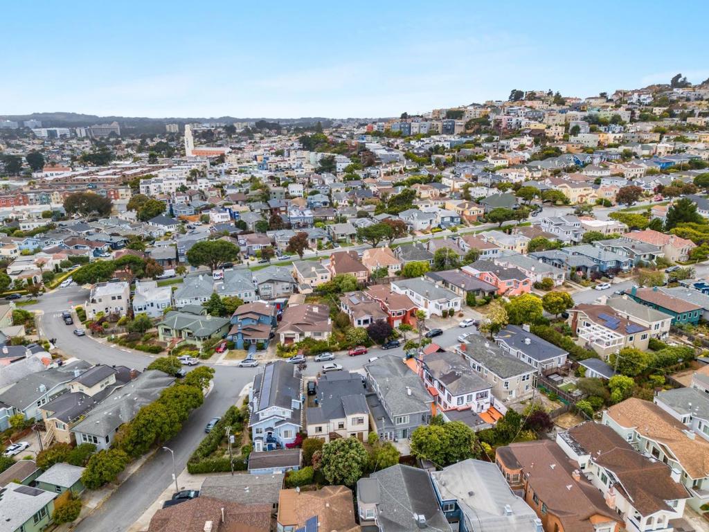 Discover a truly unique income property nestled in the serene Westwood Park neighborhood of San Francisco. This sophisticated home at 52-54 Eastwood Drive underwent a complete renovation down to the studs in 2014-2015, resulting in a modern and elegant residence. The extensive remodel included the addition of bedrooms and bathrooms, as well as a fully insulated and reinforced foundation, new plumbing, and electrical systems. Spanning 2,704 square feet, the home offers 6 spacious bedrooms and 6 bathrooms, making it ideal for multigenerational living or as an income-generating property to assist with mortgage payments. The property's separate gas, water, and electric meters provide flexibility, while the freshly painted interior and exterior, including the driveway, fences, and backyard ground, exude a fresh and inviting atmosphere. Additional features include a detached two-car garage and extra driveway parking, ensuring ample space for multiple vehicles. Set on a 3,628 square foot lot, this residence offers both tranquility and convenience in a safe, desirable location. Whether you're looking for a family home or a smart investment opportunity, this property is a standout in the San Francisco market.