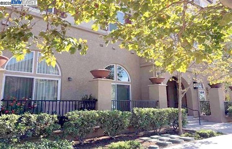 This unit is absolutely gorgeous and great condition. Open space and partial view Dublin Ranch Town home style Condo/ “ Terraces” Quite setting/park/use party/occasional Facilities. Swimming pool/gym, Close to Freeway. Easy access to HWY 580/680/BART/Theater/Parks/ Shopping/Dublin Ranch Elementary School/ Middle School/high school. 2 bedroom Suites ( each room has own Bath)/Separate Living room and Dining room/Beautiful Hard wood floor Kitchen and Dining room. Upgraded carpet/Washer/Dryer/Fridge included/Window covering 2 car attached garage/Front Entrance in street level Availability is now. No Smoking. No pets. Home Association Due (HOA) paid by owner Tenant will be required Renters Insurance at lease signing