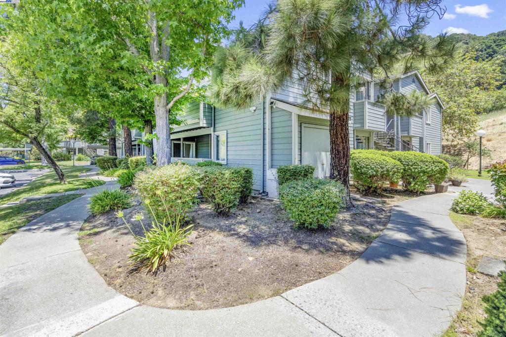 Discover comfort and convenience in this updated 2-bedroom, 2-bath condo offering 1,123 sq. ft. of inviting living space. Ideally located near Oakland, Berkeley, and with quick freeway access to I-580, this home combines privacy with easy connectivity. Each bedroom is a spacious en-suite with its own full bath and walk-in closet, separated by an open living and dining area. Perfect for roommates, guests, or a home office setup. Highlights include a modern kitchen, updated baths, in-unit laundry, a wood-burning fireplace, and a private enclosed terrace for relaxing outdoors. Community amenities feature a pool and hot tub (seasonal), while nearby Leona Canyon trails provide a natural escape just steps from your door. Set in the Oak Knoll neighborhood, this condo offers a peaceful setting with growing access to new shops and services. Apply with RentSpree https://apply.link/RLjZY18