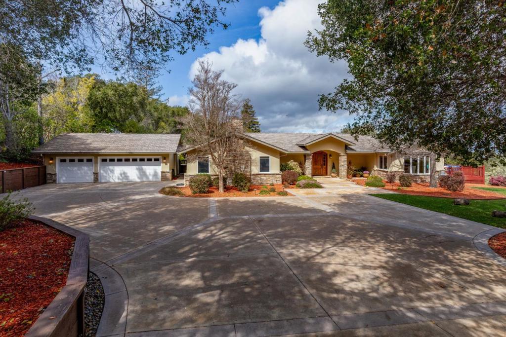 Feast your eyes on this stunning 4600 square foot beauty. 5 bedrooms and 4.5 bathrooms. Perfect one story floor plan with a huge Downstairs 5th bedroom that was used as a Gym. Sauna, Steam shower and 900 bottle temperature controlled wine-cellar downstairs. Amazing 15' x 20' Primary bedroom with walk-in closet, built-in cabinets with beverage fridge and travertine counter tops. Hardwood floors throughout the living areas. New carpets in the bedrooms. Kitchen has it all... stainless steel appliances, double oven, 6 burner Thermador gas cook top, 2 dishwashers, 46" built in refrigerator, cabinets with seeded glass/lighting, Granite counters and huge 8' island. 14' x 21' dining room, 16' x 22' Living room, sweet 18' x 20' Family room with vaulted ceilings right next to the kitchen... Large laundry room with sink and an abundance of cabinets. All this on an acre, pool, 3car garage with new Epoxy coating and an attached 18' x 12' work shop. Saratoga Schools...