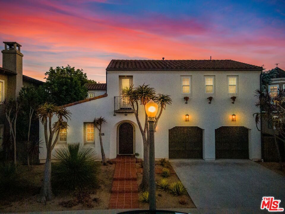 Perfectly situated on a quiet cul-de-sac in the prestigious One Westbluff community, this traditional Mediterranean-style home offers the ideal combination of space, privacy, and a highly desirable indoor-outdoor layout designed for both everyday living and effortless entertaining.You'll fall in love upon entering as the entry opens to a bright and inviting view of the serene courtyard, creating a peaceful space to welcome guests. A formal dining room offers the perfect setting for hosting gatherings, while the kitchen flows seamlessly into the breakfast area and spacious family roomforming a natural heart of the home where everyone can come together.A well-positioned downstairs guest bedroom provides comfort and privacy for visitors. Upstairs, three additional bedrooms include an oversized primary suite with a generous en-suite bath and a huge walk-in closet, offering a true retreat. A flexible bonus area upstairs adds room for a gym, playroom, or creative space, while a dedicated secondary living space is perfect for movie nights or a game room. For added convenience, the laundry room is also located upstairs. Outside, the private backyard is framed by mature landscaping, creating a quiet escape ideal for relaxing, dining al fresco, or entertaining. A tranquil side yard with a soothing fountain adds yet another peaceful outdoor space to enjoy. Located within One Westbluff, one of Los Angeles' semi-private, blufftop communities residents enjoy access to a children's playground, grassy park for picnics, 24/7 security, and a walking trail with sweeping city, ocean, and mountain views. Just minutes to Playa Vista's Runway, LMU, LAX, and LA's most desirable beaches, and ideally positioned between the luxury of Beverly Hills and the energy of the South Bay, this is Silicon Beach living at its very best.