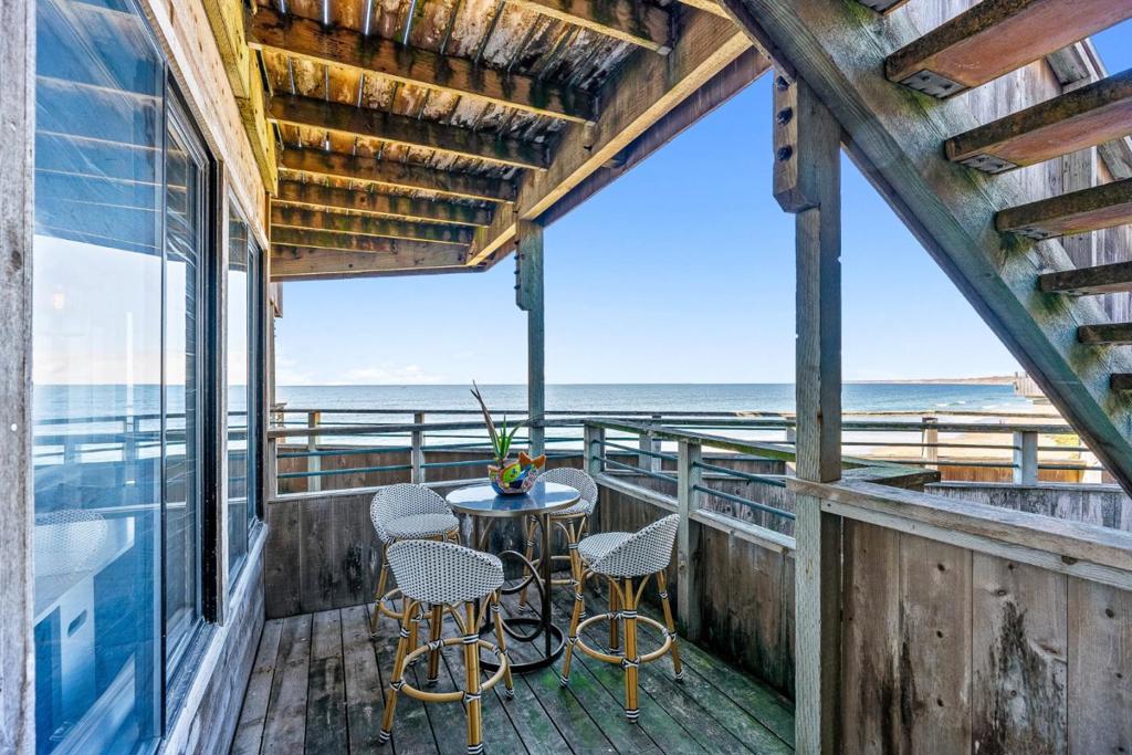 Wake up to the sound of crashing waves and fall asleep under a canopy of stars in this rare lower-level beachfront condo with jaw-dropping white water views stretching all the way to Santa Cruz. Just steps from the sand, this coastal gem is nestled in an oceanfront building tucked off the beaten pathoffering both privacy and direct access to Del Monte Beach. This tastefully updated unit features an open floor plan, remodeled bathroom, marble countertops, and stainless steel appliances. A true rarity: the convenience of an in-unit washer and dryer sets this condo apart from others. A large primary bedroom features a second private deck, where you can soak in panoramic beach views, and spot dolphins playing in the surf with the lights of Monterey twinkling in the distance. Located in a secure, gated community, residents enjoy a resort-style lifestyle with amenities including pools, spas, a sauna, fitness center, and game rooms. Take a peaceful beach stroll to Fishermans Wharf or simply relax and savor the coastal lifestyle. Whether you're seeking a full-time retreat or a weekend escape, this is the beachside sanctuary you've been dreaming of.