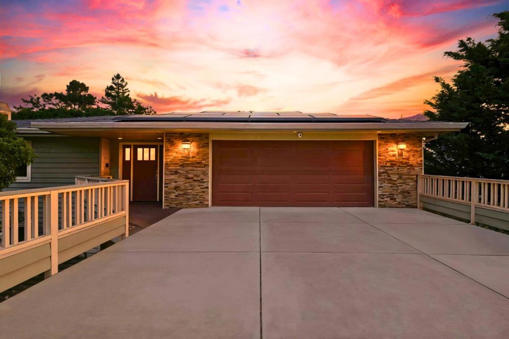 Perched on a serene hillside in coveted Belmont Hills, 2774 Belmont Canyon Rd is a custom, builder-owned 5-bedroom, 3.5-bath residence offering luxurious multigenerational living, panoramic Bay and city light views, and an exceptional layout. This two-story home exudes high-end craftsmanship with thoughtful upgrades, including two private bedroom suites, multiple view decks, and refined interior finishes. The main suite features walk-in closets, a spa-inspired bathroom with double vanities, steam shower, private sauna, and a dedicated view deck. The grand living area seamlessly connects formal living and dining spaces with a chefs kitchen featuring a walk-in pantry, wine fridge, and custom cabinetry. Natural light fills every room, and three spacious outdoor decks invite relaxed lounging or lively entertaining while overlooking the surrounding hills and Bay. Additional features include fully owned solar panels, smart home climate, security, and irrigation systems, engineered hardwood floors, central vacuum, laundry and utility room, and abundant storage. Enjoy exceptional privacy in a lush, low-maintenance setting just minutes from Crystal Springs trails and Water Dog Lake. Top-rated schools and easy access to highways 92 and 280, and major tech employers.