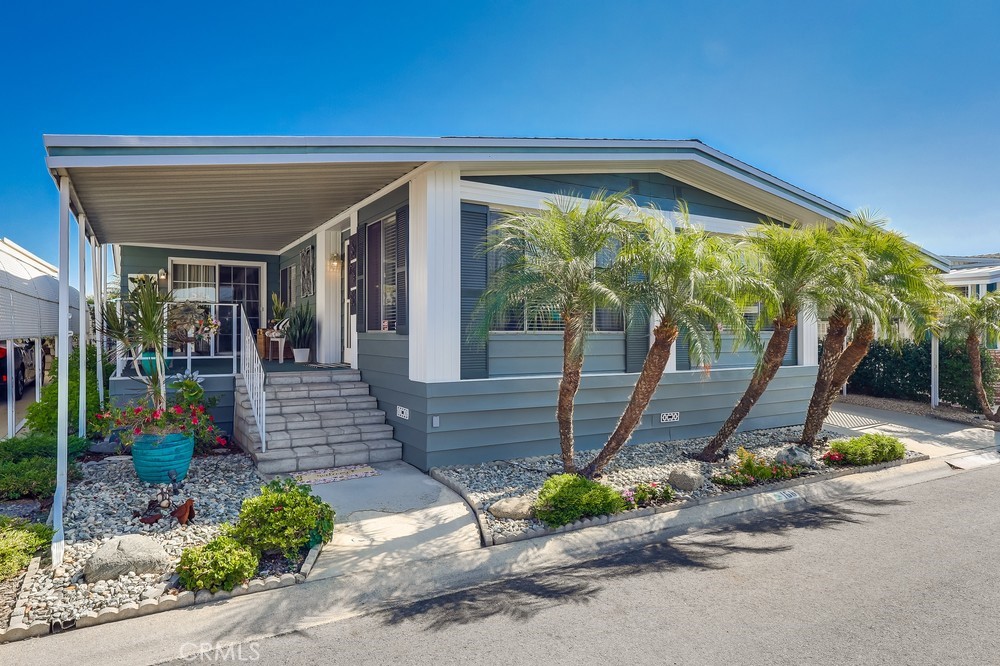 Spacious Triple-Wide Home in Desirable Twin Oaks Park – La Verne
Welcome to this immaculately maintained triple-wide manufactured home located in the sought-after Twin Oaks Park in La Verne. Offering 1,680 sq. ft. of comfortable living space, this 2-bedroom, 1.75-bath home was built in 1977 and features an expansive, open layout with both formal living and family rooms—perfect for entertaining or relaxed everyday living.
Enjoy the outdoors with a rear patio enhanced by brick hardscape and lush landscaping, plus a large covered front/side patio ideal for morning coffee or evening relaxation. A carport with room for 3 vehicles, a large storage shed, and beautiful mountain views complete the exterior features.
Inside, you’ll appreciate the indoor laundry, plenty of natural light, and a well-kept interior ready to move in. Located within walking distance to the clubhouse, where residents can enjoy a large pool, library, and a variety of senior-friendly activities.
Rent-controlled and freeway accessible, this home is conveniently located near shopping, dining, and all the amenities of La Verne. Don't miss your chance to live in one of the area's most welcoming and well-established senior communities!