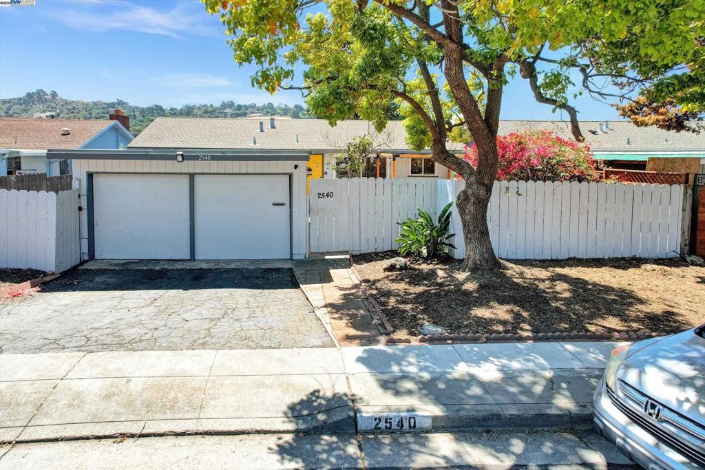 One percent credit back for buyer's closing costs! Beautifully updated 4-bedroom, 2-bath home nestled in one of Richmond’s most desirable hilltop neighborhoods! Designed with flexibility in mind, the open-concept main level features 3 bedrooms and 2 full baths, with a seamless flow between the kitchen, dining, and living areas. The remodeled kitchen offers sleek quartz countertops, custom cabinetry, and a center island with breakfast bar—ideal for everyday living and entertaining. Downstairs offers a spacious family room and a private 4th bedroom—perfect for guests, in-laws, or an au pair—along with exterior access to manicured backyard and a laundry area with built-in cabinetry and utility sink. Stylish updates throughout include painted wood ceiling beams, custom closet doors, luxury vinyl plank flooring, recessed lighting, and dual-pane windows. Major system upgrades include new central A/C, new furnace, updated plumbing, improved drainage, and a new retaining wall in the crawlspace. Enjoy the newly added front yard pergola—perfect for relaxing under the twinkling strung lights with a glass of wine. Conveniently located near Contra Costa College, Highways 80/580, public transportation, and Hilltop Plaza shopping and dining. A perfect blend of comfort, style, and convenience!