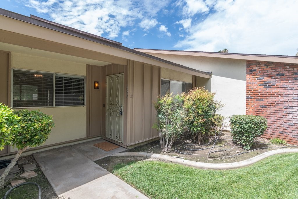Beautiful 3 bedroom 2 bath Azure Hill Village condo in Grand Terrace. This home features an open concept with beautiful wood flooring throughout. The kitchen has stunning granite countertops, with plenty of prep space for the biggest of feasts! Additionally, there is a large detached two car garage and beautiful partial covered patio for entertaining and relaxing. The community has a large swimming pool and immaculate manicured grounds. This home is move in ready! Schedule your showing today!!