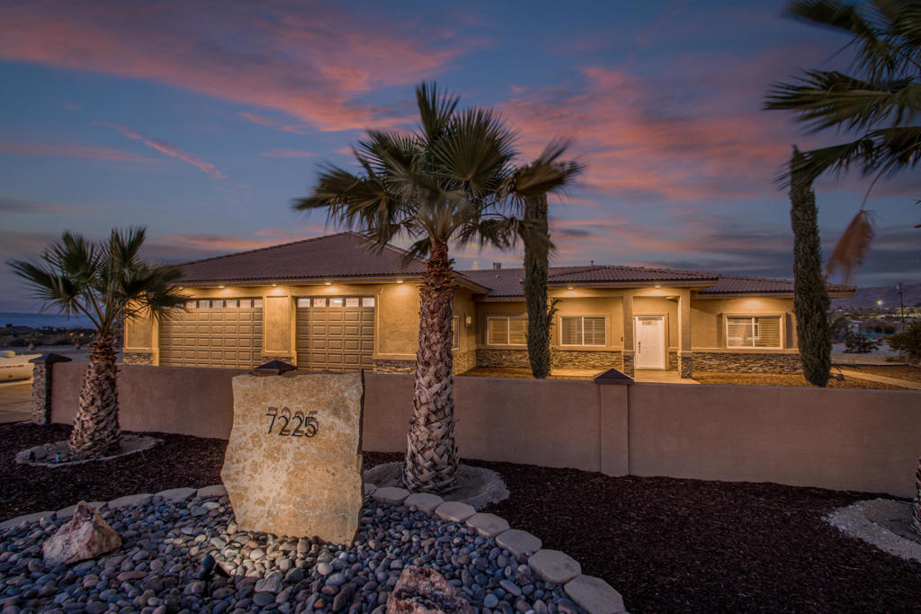 Discover your perfect oasis at 7225 Adobe Road in 29 Palms! Featuring a fully built out 16 car garage, this exceptional property offers a spacious luxury home on an acre. With 3 bedrooms, a media room, and 3 full bathrooms this home is ideal for relaxing or entertaining. Polished concrete floors not only look amazing but are easy to maintain. The highlight is the fully built-out 16-car garage, complete with air conditioning and air compressors, perfect for car enthusiasts, business owners, or short-term rental income. Just 4 minutes from Joshua Tree National Park, and a minute to the casino and downtown 29 Palms, this home combines convenience with lifestyle. Whether you're seeking a unique short-term rental opportunity or a versatile base for a business, this property is a rare gem waiting for you to make it yours! This home was originally constructed by a builder for himself and has a very extensive list of upgrades and attention to detail that will far surpass your expectations in quality of construction.