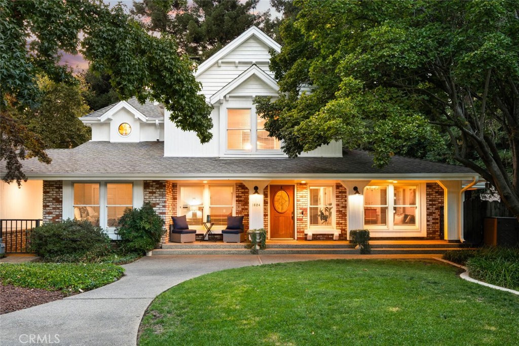 Stunning Bidwell Avenue Home with Creekside Views, Pool & Timeless Charm! On the market for the first time in over 40 years, this home offers 3 bedrooms, 2.5 baths, an office, and 2,482 sq. ft. of living space—all set on nearly a half-acre lot along picturesque Little Chico Creek. Tucked away in a serene, country-like setting yet located in the heart of Chico, this property is surrounded by majestic redwood trees and lush mature landscaping, providing privacy and tranquility rarely found so close to town. This home has also operated as a SUCCESSFUL Airbnb/VRBO with GREAT rental potential. Rental income verification available upon request. From the moment you enter, you’ll be drawn to the spacious living room with rustic charm, highlighted by exposed wood beams, a central brick fireplace, and custom built-in shelving. Large sliding glass doors fill the space with natural light and open to an inviting patio overlooking the beautifully landscaped backyard. The kitchen is a true centerpiece, boasting Italian tile, warm oak cabinetry, and brand-new stainless steel appliances. Conveniently located downstairs are two generously sized guest bedrooms, a stylishly updated bath with a walk-in shower accented by floral Italian tile, and an indoor laundry room. The entire upstairs is dedicated to the expansive primary suite, where a private balcony offers peaceful views of the backyard and towering redwoods. The primary bath is a retreat of its own with more elegant Italian tile, a sunken tub framed by custom stained glass artwork, and a spacious walk-in shower. Step outside to experience your own private resort. The lagoon-style pool with soothing waterfall is surrounded by mature landscaping and towering redwood trees, creating a secluded, natural ambiance. A hot tub nestled beneath the canopy of trees, multiple patio spaces for lounging or entertaining, and a poolside cabana bath complete this outdoor oasis. The 2-car garage currently serves as a bonus room perfect for gatherings, but can easily be used as traditional garage space if desired. This home has been lovingly maintained and thoughtfully updated with modern features including new interior & exterior paint, new carpet, refinished hardwood floors, new fireplace hearth, new SEPTIC, split system AC, repaired/replaced central HVAC ductwork, brand new water heater, RV parking with hookups —just to name a few. Don’t miss out—perfect as a snowbird escape or vacation home that helps cover costs!