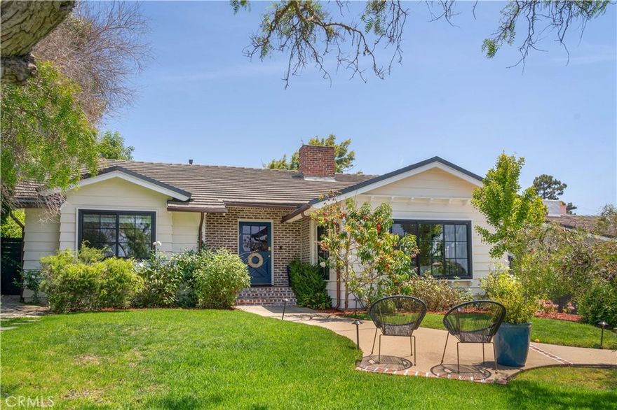 Nestled in the prestigious Lower Lunada Bay neighborhood of Palos Verdes Estates, 2116 Palos Verdes Drive West offers an exceptional coastal lifestyle. This home presents a rare opportunity to own a piece in this highly sought-after community. The curb appeal is undeniable. A beautifully manicured front yard leads to a chic exterior featuring exposed brick, lap siding, and a vibrant blue front door that provides a striking first impression. Step inside to an inviting open floor plan, where vaulted ceilings - a hallmark of its mid-century design - create a sense of spaciousness. This one level home offers three bedrooms, including a primary suite that provides a peaceful sanctuary with its own ocean views and ample closet space. The heart of the home is the meticulously designed kitchen. It's an entertainer's dream, featuring a large center island, gleaming granite countertops, stainless steel appliances, and a farmhouse sink. A built-in wine fridge is a perfect addition for casual gatherings, and the open access from the kitchen to the backyard, makes hosting seamless. The sunken living room, with its charming fireplace, provides a cozy retreat, while the dedicated laundry room and a bonus office/play area, add to the home's practical and flexible layout. Experience seamless indoor-outdoor living with a private, grassy backyard that's an entertainer's paradise. Complete with a built-in fire pit, outdoor TV, and BBQ area, it's the perfect setting for al fresco dining and relaxing. This turn-key residence also boasts recent upgrades, including newer windows, sliding patio doors, A/C, and copper gutters. The location is truly unbeatable, with Lunada Bay Plaza, Palos Verdes High, and Lunada Bay Park just a short stroll away.