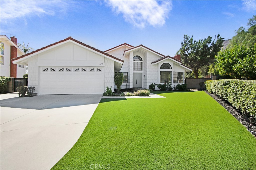 Tucked at the end of a QUIET CUL-DE-SAC in the hills of Walnut, this GORGEOUS, FULLY REMODELED residence blends modern design with everyday comfort. Step inside to IMPRESSIVE CATHEDRAL CEILINGS and sun-splashed living spaces that create an airy, open feel. The CHEF’S DREAM KITCHEN steals the show—styled cabinetry, sleek countertops, and thoughtful storage make weeknight dinners and weekend entertaining effortless. Retreat to the STUNNING PRIMARY EN SUITE, a SPA-LIKE SANCTUARY with a HUGE WALK-IN SHOWER wrapped in beautiful designer tile. Outside, the home SITS ON A HUGE 15,000 SF LOT—perfect for family gatherings or to BRING YOUR IMAGINATION and build your dream backyard oasis. Think pool, outdoor kitchen, gardens, play space—the possibilities are wide open. Live the Walnut lifestyle with the award-winning Stanley G. Oswalt Academy just blocks away, plus nearby parks, walking trails, dining, entertainment, shopping, and more. Don’t miss out—your new home awaits!