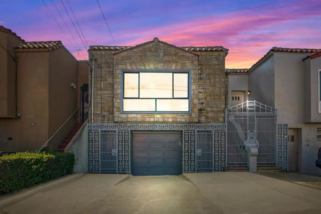 Tastefully upgraded 5BD/2BA home in the desirable Outer Parkside neighborhood offering flexibility, function, and style. The upper level features 3BD/1BA, a bright open layout, modern kitchen with quartz counters, new appliances, and new flooring. Downstairs, the 2BD/1BA space includes its own contemporary kitchen and upgrades ideal for guests, rental potential, or extended family. A private laundry area, 1-car garage, and a large backyard with a striking china jade-colored deck round out the features. Enjoy a beachside lifestyle just moments from Top Rated Schools, Ocean Beach, SF Zoo, and the Great Highway, with quick access to Muni, Sunset Blvd, and Sloat.