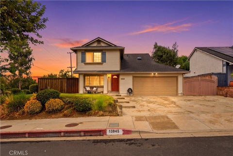 Photo of 13945 Simshaw Avenue, Sylmar, CA 91342 (MLS # DW26207851)
