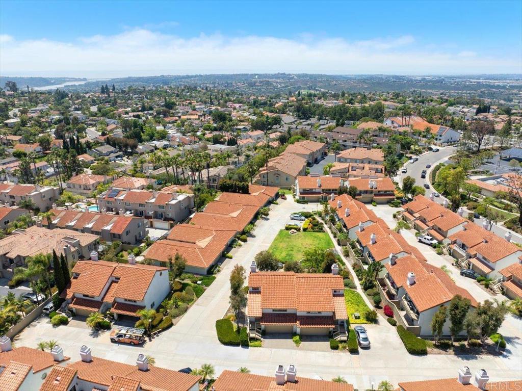 Impeccably Remodeled Carlsbad Condo with Ocean Views! Prime La Costa Location! Welcome to 6686 Corte Maria, beautifully remodeled, spacious 2-bedroom, 2-bath condo nestled in one of La Costa’s most desirable communities of La Costa Meadows. This bright and airy home features vaulted ceilings and western facing windows that create a sense of openness, complemented by natural light and a functional floor plan.On the first floor you will find the primary bedroom, bathroom and slider outside to a private, fenced in patio. Laundry room is also located on the first floor. The second floor features a secondary bedroom and full bath, large living area, kitchen and spacious pantry, fireplace. Enjoy stunning ocean views from the private upstairs deck, perfect for morning coffee, sunset lounging, or entertaining. The home includes a private 2-car garage, offering both convenience and ample storage. Located in a meticulously cared-for and quaint community, this condo offers peace and privacy while being just minutes from top-rated schools, shopping, dining, golf courses, and the beach.