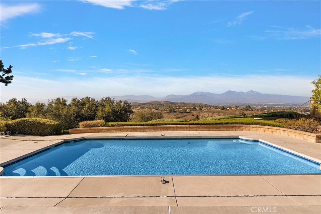 Welcome to 524 Topside Place, where stunning panoramic canyon and mountain views meet exceptional opportunity. Perched at the end of a quiet cul-de-sac, this single-story 4 bed, 2 bath home offers breathtaking, unobstructed vistas from its expansive 21,612 sq. ft. lot. With 1,791 sq. ft. of living space, this 1988-built gem is ready to be reimagined. The backyard is your private retreat, complete with a sparkling pool, fruit trees (fig, citrus, and guava), and plenty of space to entertain or expand. A peaceful covered porch and courtyard are perfect for relaxing and enjoying a quiet morning coffee or tea. Bring your vision and make it your own! Located in a well-established neighborhood, known for its mature trees, parks, hiking trails, shopping, and golf. This home needs some TLC—but with a view like this, it’s an opportunity you don't want to miss. Full repipe of home with Lifetime warranty in 2024. Priced to sell—create your one-story dream home retreat!