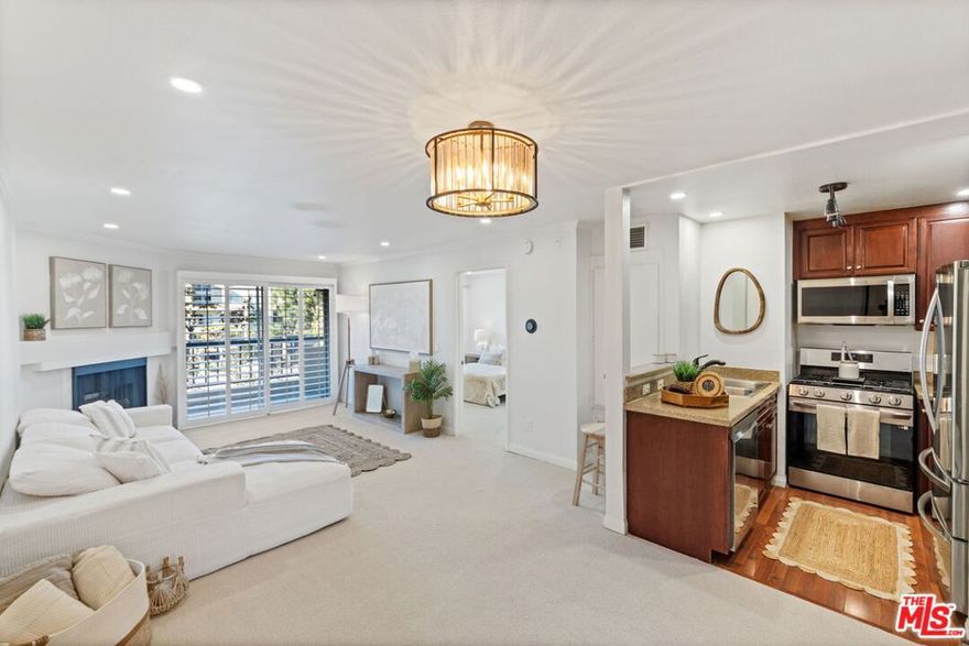 Your dream condo in the world-famous, resort-style MET Warner Center is HERE and it's ready to steal your heart! Welcome to the most coveted END-UNIT in the entire community  a rare, light-drenched beauty that most buyers only dream about! Step inside and instantly feel the WOW factor: an exclusive EXTRA WINDOW (that 99% of units don't have this!) floods the entire home with gorgeous natural sunlight and refreshing cross-breezes all day long.Imagine sipping your morning coffee on your private balcony while overlooking the sparkling resort pool  pure vacation vibes every single day! This is not your average condo this is a fully upgraded SHOWPIECE: Brand-new plush carpeting & fresh designer paint Gourmet kitchen boasting premium stainless-steel appliances LG smart microwave, sleek 4-door refrigerator, whisper-quiet dishwasher & 5-burner gas range with built-in air fryer Elegant crown molding & plantation shutters throughout Recessed lighting + smart dimmable switches (works with Alexa & Google!) Nest thermostat & Ring doorbell already installed  move-in ready luxury!Prime front-of-the-complex location = super quiet (far from the freeway), quick & easy access in/out of the 24-hour guard gates, and just steps to the incredible amenities everyone raves about: 4 pools, 6 lighted tennis courts, racquetball, basketball, state-of-the-art gym, and lush tropical grounds.PLUS  highly desirable TANDEM 2-CAR PARKING spots included!This is the ONE buyers wait months (sometimes years!) to find. Perfect for first-time buyers, savvy investors, or anyone craving that effortless lock-and-leave resort lifestyle in the heart of Warner Center  minutes to The Village, Westfield Topanga, Whole Foods, and the 101.