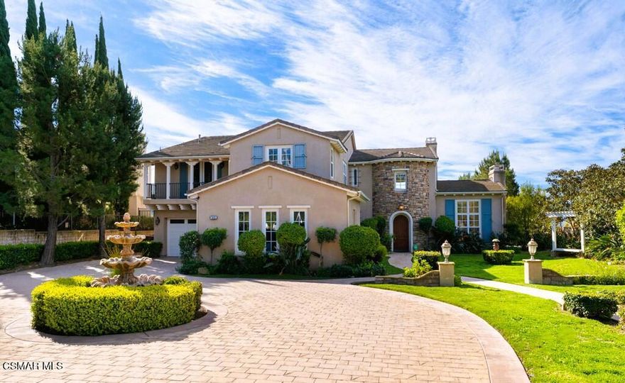 Welcome to luxury living in the heart of Camarillo's prestigious Calarosa Ranch community. This magnificent 5-bedroom, 6-bathroom Fabulous VIEW Estate spans over 5,200 square feet of exquisite craftsmanship and elegance, nestled on a sprawling 29,647 square foot lot.  Upon arrival, the enchanting curb appeal captivates with a circular driveway, grand water feature and a stately rotunda entrance.  Inside you're greeted by vaulted ceilings and an abundance of windows that bathe the interior in natural light, illuminating the polished travertine flooring throughout the main living areas. The formal living room beckons with a cozy fireplace and serene views of the front yard.  For the avid readers and/or guests seeking refuge, a library/junior suite awaits, boasting its own fireplace and private bath.  Enjoy the gourmet-style kitchen featuring granite counters and stainless-steel appliances including a commercial grade oven with 6 burner stove-top, built-in Subzero refrigerator, built-in microwave, warming drawer and 2 Bosch dishwashers.  A Butler's pantry and dual island/peninsula, equipped with wash basins, dairy/vegetable refrigerator and a breakfast bar, cater to both functionality and style.  Adjacent lies the formal dining room, creating the perfect ambiance for memorable gatherings.  The family room is a comfy retreat enhanced with custom built-in cabinets, new electrical Hunter Douglas window shades and a beautiful river-rock surround fireplace, offering warmth and sophistication.  A convenient 1/2 guest bathroom, full-size laundry room as well as an attached, direct access 4-car garage complete the main level interior.  The second story features an expansive master suite boasting a fireplace, ensuite bath with shower stall/soaking tub, sitting room, office/study and a large balcony showcasing breathtaking views of Camarillo and the ocean beyond.  A huge loft (wired for sound), screening room or 6th bedroom and two secondary bedrooms, all with ensuite bathrooms and ample closet space, offer flexibility and privacy for family members or guests.  The incredible backyard is an entertainer's paradise highlighting an outdoor kitchen, gas firepit, water fountain and sprawling grassy area perfect for outdoor enjoyment and relaxation.  Centrally located near shopping, dining, schools and more - this estate offers the ideal blend of luxury, comfort and convenience. Welcome home!