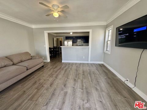 Photo of 1048 W 62nd Street, Los Angeles, CA 90044 (MLS # 26774427)