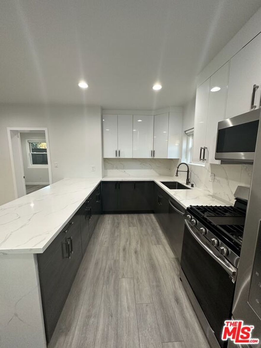 Discover a beautifully updated 2-bed/2-bath apartment near LAX, designed for comfortable modern living. This contemporary home includes 1 parking space with an EV charger and features smart entry locks and in-unit washer/dryer for everyday convenience. Inside, you'll find a spacious kitchen with sleek stainless steel appliances and ample counter space. Each room is equipped with its own energy-efficient mini-split A/C system for personalized climate control.