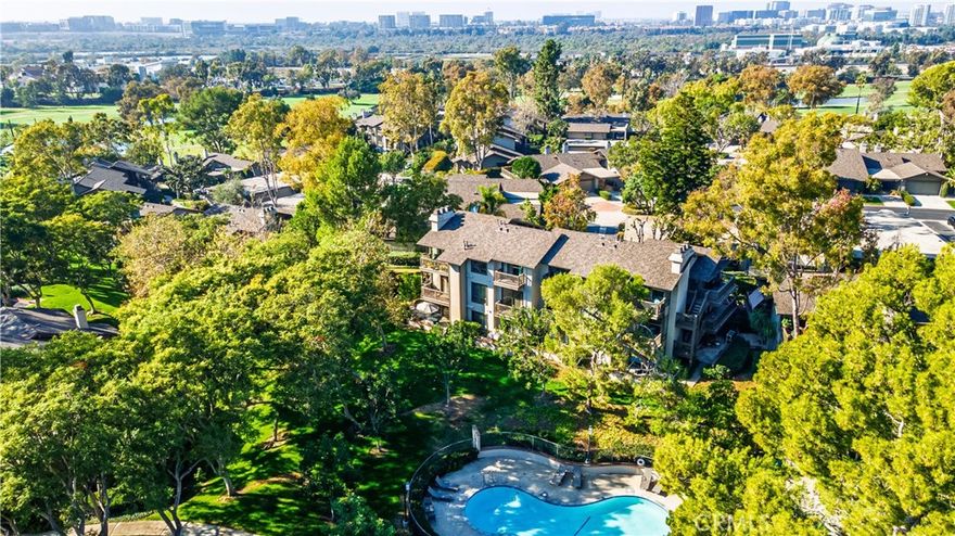 EXPANSIVE VIEWS OF POOL AND SPA, LARGE GREENBELT AND TREES FROM CUL-DE-SAC CORNER LOT IN INTERIOR OF COMMUNITY! AS-IS fixer-upper priced to sell, lowest price in community, so you can do the upgrades you want. This middle-unit condo has only three steps up to the front door with inside living area all on one level, and a 2-car detached garage right in front with additional storage space. Bright home with open floorplan, high ceilings, lots of large windows, indoor laundry, and three outdoor decks with views of all the greenery! Den off Living Room can be converted to a third bedroom or used as an office. Kitchen is open to Dining Room with sliding glass door to an outdoor deck and Dining Room is open to Living Room with fireplace and sliding glass door to separate outdoor deck with views of pool and greenbelt. Down the Hall is the Front Bedroom and Hall Bathroom, and at the end of the Hall is the Primary Bedroom and Primary Bathroom which has Vanity area with double sinks that is separate from shower room. The Primary Bedroom has sliding glass door to its own outdoor deck overlooking the pool. New roof and tenting completed Spring 2023. Residents enjoy access to two community pools and spas, with association dues covering water, trash, and exterior maintenance. Ideally located in the esteemed Irvine School District, including University High, and just minutes from UCI, William Mason Park, John Wayne Airport, Newport Beach, and Fashion Island. This home will go fast! See Virtual 3D Walkthrough at https://my.matterport.com/show/?m=eXa62WUkeZ4&brand=0