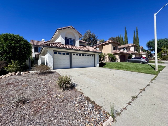 Welcome to this beautiful and spacious 4 bedroom, 3 bathroom home with a 3 car garage located in the desirable Malaguena community of Murrieta, available for lease! This residence offers a bright, airy atmosphere with upgraded flooring, abundant windows that fill the home with natural light, and a fantastic open layout. Upon entry, you’re greeted by a stylish formal dining area to the left and a spacious great room and kitchen straight ahead. To the right, a hallway leads to a main level bedroom, a full bathroom, and a convenient laundry room with direct garage access. The kitchen features elegant dark countertops, crisp white cabinets, ample storage, a breakfast bar, and opens to an additional dining area as well as the cozy family room, complete with a fireplace and sliding door to the backyard. Upstairs, you’ll find the remaining bedrooms, each thoughtfully positioned for added privacy. The primary suite is a true retreat, showcasing generous space, a two-way fireplace, and a beautifully upgraded ensuite with dual vanities, a spa-like shower, and a spacious walk-in closet. Outside, the backyard offers an open patio with no rear neighbors, perfect for relaxing or entertaining. Additional highlights include a 3 car garage and an ideal location close to freeway access, shopping, dining, and more, providing the perfect blend of comfort and convenience. Schedule a showing today to experience all this exceptional home has to offer!
