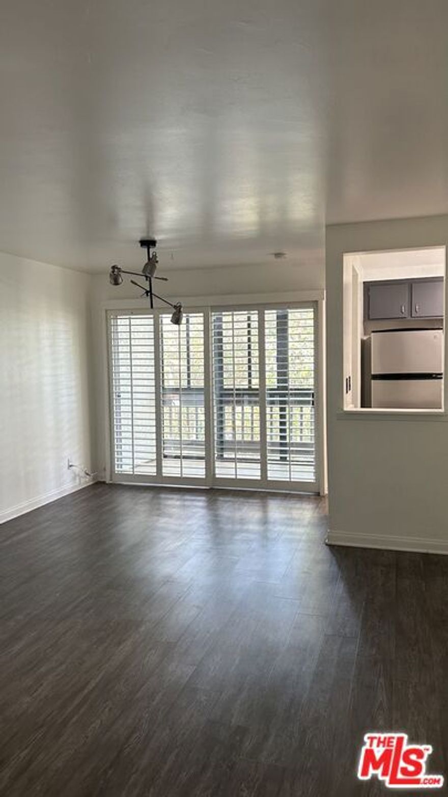 Lakeside Village 24-hr guard gated community. Extensively renovated 1bd/1ba second floor condo with covered patio. Updated kitchen with stainless steel appliances, central heat & cooling, wood flooring. Assigned subterranean 1 parking space and guest parking. Indoor laundry conveniently located on each floor. 3 community pools, clubhouse, and gym. Landlord to cover HOA fees, which include access to include gas, water, basic cable, trash and 24 hour-security.