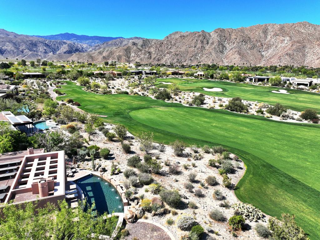 Nestled within the prestigious Reserve golf community, this exquisite 5,444 sq. ft. solar home offers the ultimate blend of great style and casual living. An exceptionally spacious primary suite also captures stunning sunsets and snow-capped mountain views. This much desired 4-bedroom desert retreat includes a detached guest casita with its own separate living area for ultimate privacy. Designed with both everyday living and grand entertaining in mind, the gourmet kitchen, a media room and open-concept floor plan seamlessly connects the warm interiors to the breathtaking outdoor spaces. Expansive mountain views create an unforgettable backdrop--perfect for hosting family and friends, or relaxing by the pool and spa. Whether you're enjoying a quiet morning coffee or entertaining guests under the desert stars, this home epitomizes the best of luxury desert living. The Reserve Club offers world class amenities including a Tom Weiskopf-Jay Morrish designed championship golf course, three Trophy Holes and a double-ended practice range. The Club Village includes Clubhouse; Lakehouse for casual dining; Fitness Center with exercise rooms, extensive cardio equipment, Jr. Olympic size pool, Tennis and Pickleball; and Golf Shop.