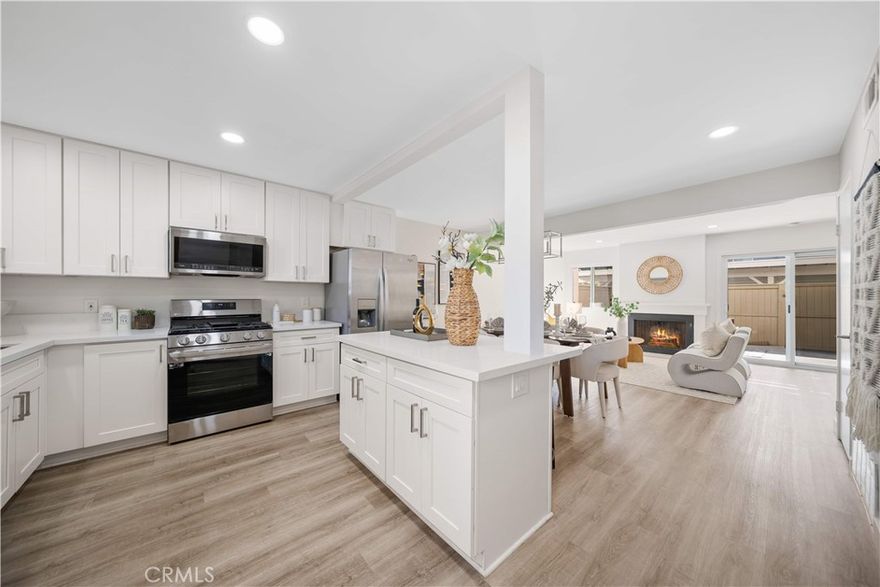 Gorgeous remodeled 3-bedrooms and 2-bathrooms townhouse with an open floor plan in the coveted Woodbridge Neighborhood. Brand new kitchen opens to the living and dining rooms with an island. The open living space brings in plenty of natural light from both sides of the building. One full bathroom upstairs with two doors can be accessed from the master bedroom and the hallway, another full bathroom is downstairs. Outside, the lovely courtyard is a great space for morning coffee or evening chats with your family or friends. The two-car detached carport is also right outside the fence and makes it easy to access the home after returning from work, school or shopping, and there is a good size storage room with door and lock in the backyard. Meadow Park Elementary School, South Lake Middle School, and Woodbridge High School are just within the walking distance. Woodbridge Village community has more than 20 pools, and many tennis courts with two beach lagoon pools and two beautiful lakes, shopping centers with movies, food, and entertaining activities for all ages. Since Woodbridge is located in the center of Irvine, you are close to the beach, John Wayne Airport, UCI, South Coast Plaza, The Spectrum, hospitals, as well as all the restaurants and shopping centers in the city.