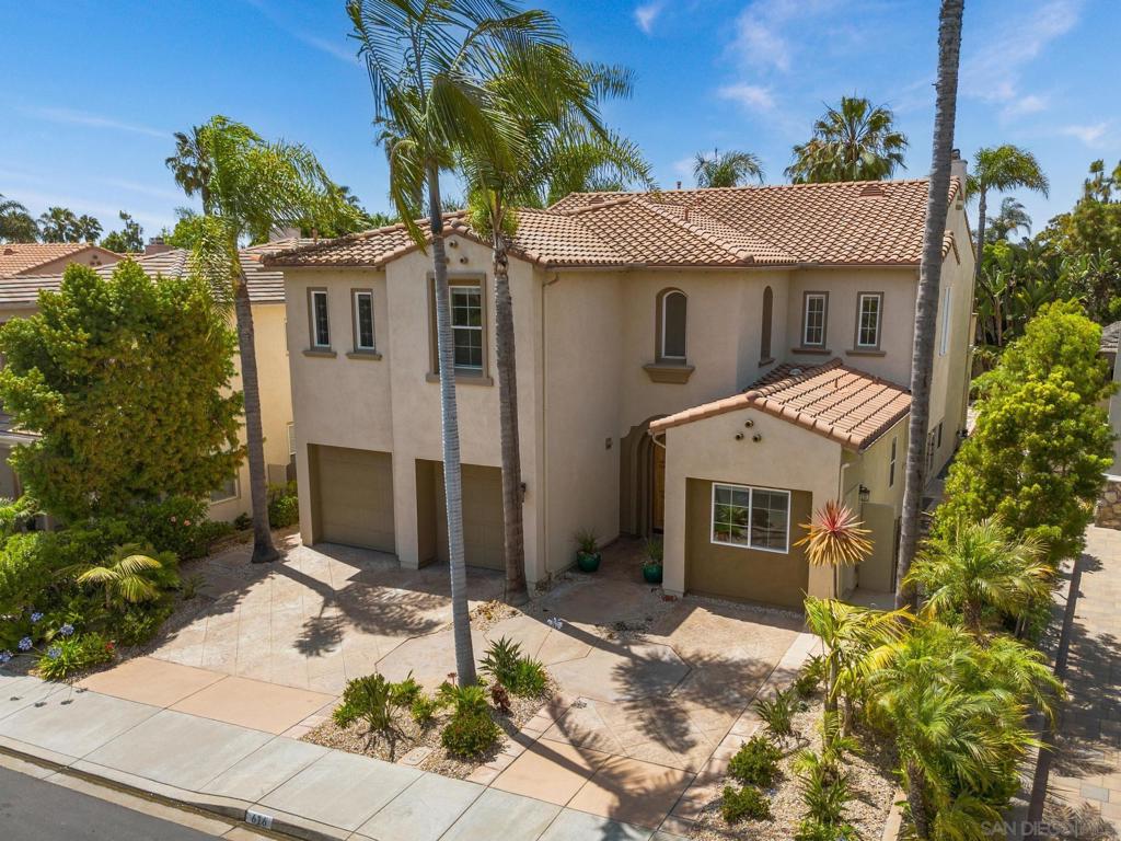 Location, Location, Location! Live by the beach in South Carlsbad, west of I-5 and just a short walk to the sand and surf in the highly sought-after gated coastal community of San Sebastian within San Pacifico. This rarely available Mediterranean-style home is the largest model and features an additional permitted ADU with its own separate entrance on the main level. Step into a grand circular foyer with soaring 20-ft ceilings and leaded glass windows flooding the home with natural light, creating a warm coastal ambiance. The main level features a bright open floor plan which includes a home office with custom wood cabinetry, a guest bath, a spacious living room and a formal dining room, both with French doors opening to side yards. The large kitchen, ideal for entertaining, includes a large center island, granite countertops, gas range, walk-in pantry and butler’s pantry. The open concept kitchen offers a spacious breakfast area and flows seamlessly into the family room with a cozy gas fireplace. Upstairs is a large versatile bonus room (potential 5th bedroom), plus two additional bedrooms that offer generous closet space and ensuite bathrooms. The serene and spacious primary suite offers a peaceful retreat with a private balcony featuring peek-a-boo ocean and sunset views. The suite includes a separate sitting area/workspace and a spa-like bathroom with soaking tub, a walk-in shower, dual vanities and a large walk-in closet with a window. The private backyard oasis featuring lush tropical landscaping, a paved patio with gazebo, built-in BBQ and soothing water fountains is perfect for relaxing or entertaining while the cool ocean breezes provide peace and tranquility. Additional features include a whole-house water filtration system, Smart thermostats on both levels and a separate HVAC for the ADU. The community offers a pool with lap lanes/spa, tennis courts, a basketball and volleyball court, BBQ areas and scenic walking trails along Batiquitos Lagoon. Live the coastal lifestyle - close to the beach, shopping, dining, freeways and award-winning schools.