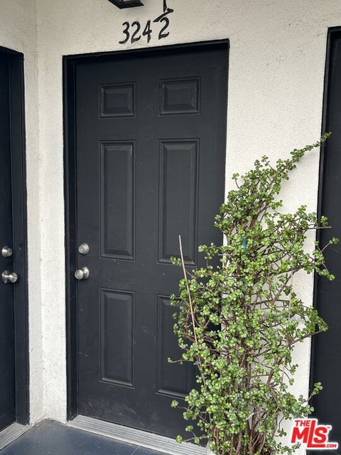 Photo of 324 W 51st Street, Los Angeles, CA 90037 (MLS # 26994983)