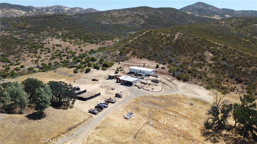 COUNTRY RANCH OF 180 ACRES in three parcels in Jerusalem Valley with a major spring feeding the home and the sizeable pond. Rolling land, much of it usable with great views and total privacy and seclusion. 1975 manufactured home, garage and animal pens. Off grid with generator power, and good solar potential. All kinds of agricultural potential. Some great home sites with panoramic valley views.