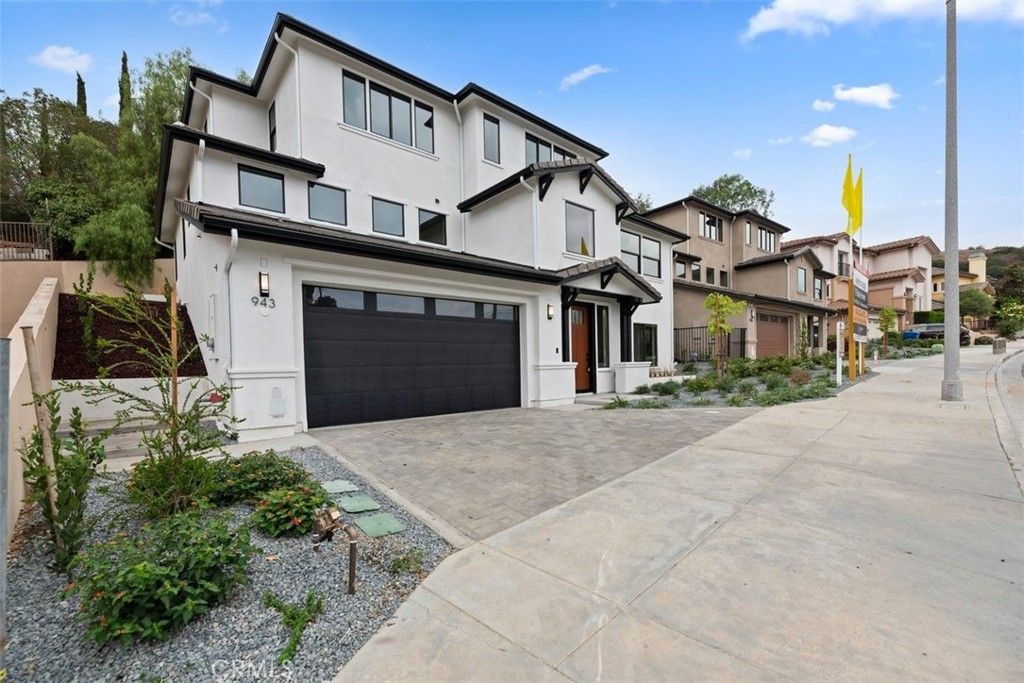 Photo of 951 N Avenue 66 Ave, Los Angeles, CA 90042 (MLS # IV26008355)