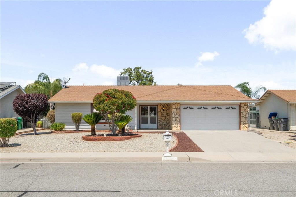 Nestled in the desirable Sun City, this well-maintained home offers comfort, style, and low-maintenance living. With great curb appeal and a tidy, drought-tolerant front yard, you’ll feel right at home from the moment you arrive. Step inside to a spacious living room that flows seamlessly into the dining area and kitchen, featuring granite countertops and ceiling fans throughout for year-round comfort. This home boasts two generously sized bedrooms and two full bathrooms, offering plenty of space and functionality.
Enjoy the bonus of an enclosed sunroom—perfect for a hobby space, morning coffee, or relaxing with a good book—that opens to the private backyard. The backyard is designed for easy upkeep and includes a covered patio, ample storage space, and fruit trees to enjoy seasonal harvests. This home is a perfect blend of comfort and convenience in the peaceful well-maintained 55+ community of Sun City Civic.