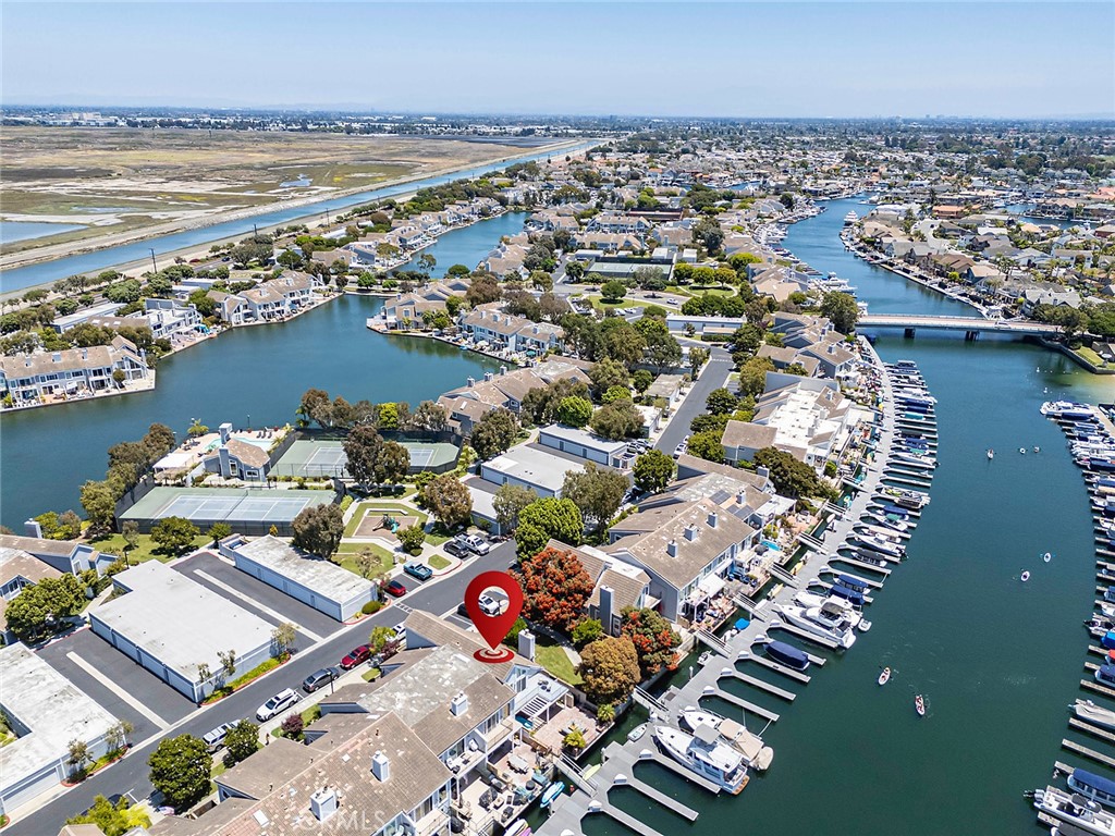 Experience coastal luxury in this beautifully updated waterfront home, ideally located in the highly sought-after Seagate community of Huntington Harbour. Positioned on a premium corner/end lot, this property boasts panoramic water views and direct access to a deep water dock — perfect for boating enthusiasts.
Originally designed as a 4-bedroom home, it currently offers 2 spacious bedrooms with the flexibility to easily convert back to the original layout. Enjoy 3 full bathrooms and an open, light-filled floor plan designed to maximize the stunning harbor views. The expansive brick patio features a spa and plenty of space for waterfront entertaining.
Additional highlights include a private 2-car garage and access to Seagate’s resort-style amenities: two swimming pools, a spa, tennis and pickleball courts, playground, lush greenbelts, and ample guest parking.
Don't miss this rare opportunity to own a turn-key waterfront retreat in one of Huntington Harbour’s most desirable communities.
Experience unparalleled coastal living in this Huntington Harbour retreat.