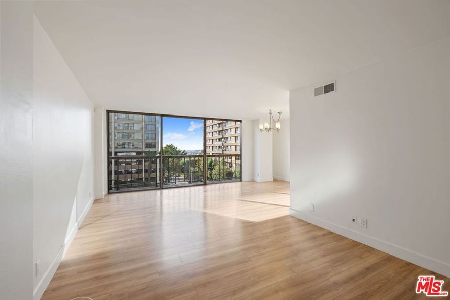 Located on the prestigious Wilshire Corridor, this light-filled corner unit offers 2 bedrooms and 2 bathrooms in a bright and spacious layout. The home features a generously sized living room and dining area, perfect for both relaxing and entertaining. Enjoy two private balconies  one off the living room facing south with city views, and another off the guest bedroom facing west.Additional highlights include two dedicated parking spaces, laundry facilities on each floor, and the security of a 24-hour doorman. The unit is equipped with central AC and heat, stainless steel appliances, and has been freshly painted. Ideally situated just moments from Westwood Village, UCLA, and an array of top-tier gyms, shops, theaters, and restaurants.