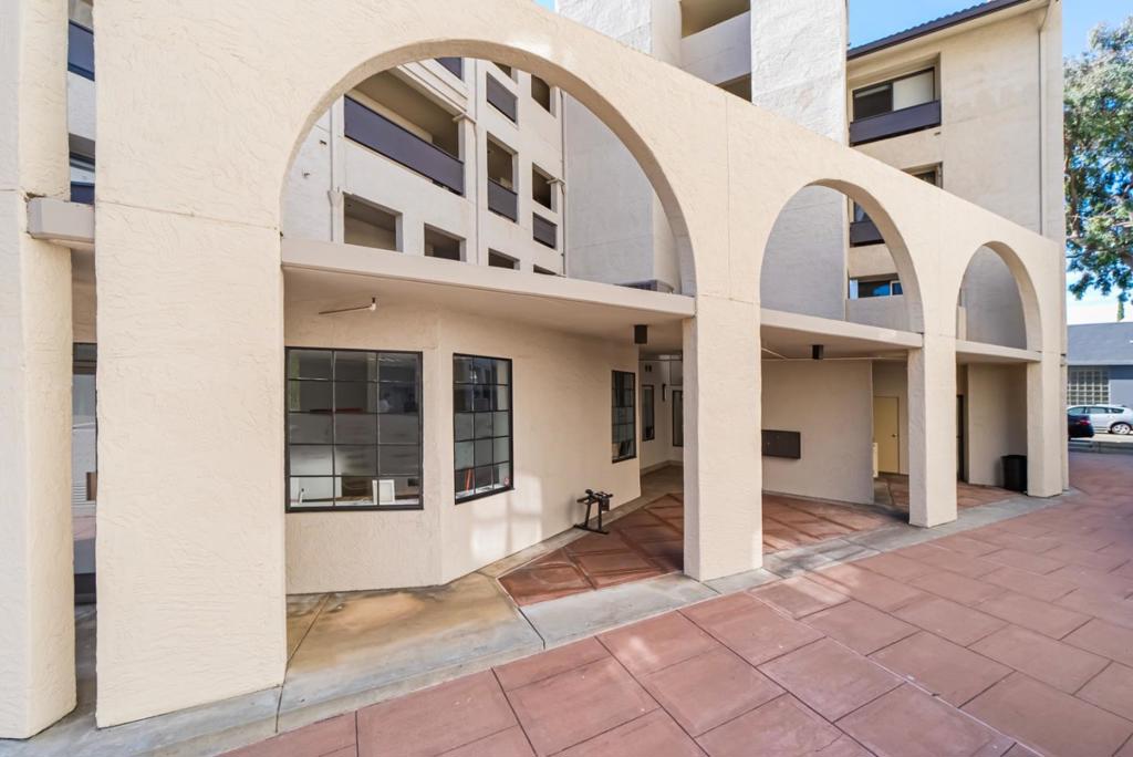 Urban Comfort Meets Downtown Convenience 165 Forest Ave, Unit 2A, Palo Alto Effortless living in the heart of downtown Palo Alto. This bright and spacious 2-bed, 2-bath condo offers a rare blend of comfort, walkable convenience, and premium locationjust steps to Caltrain, Whole Foods, University Avenues shops, restaurants, and cafés. Located on the second floor of a secure, gated building, Unit 2A features a smart split-bedroom layout with open kitchen and central living space, ideal for both privacy and flow. Natural light fills the home, and the primary suite includes a private balconyperfect for morning coffee or relaxing evenings. Enjoy air conditioning in every room, a rare and valuable amenity in this area. A full in-unit laundry room and private storage near parking add to daily convenience. Exceptional access: Your two deeded, side-by-side garage parking spaces are just steps from the elevator, which takes you directly to the units floor. Highlights: Downtown location | Gated building | Ideal 2 bed / 2 bath layout | Balcony off primary suite | AC throughout | In-unit laundry | Elevator access | Storage room | Top Palo Alto schools