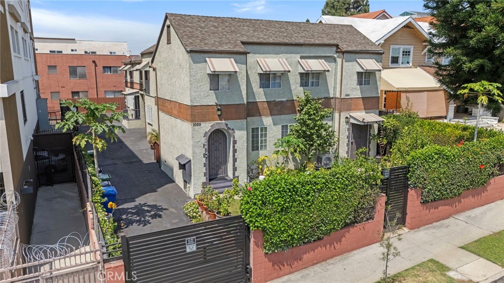 Delivered 100% VACANT, this 5-unit property in Korea-town offers immediate income potential and future redevelopment upside. The mix includes three 1-bed/1-bath units with shared laundry ON SITE , one 3-bed/1-bath, and one 2-bed/1-bath with potential to reconfigure into a 4-bed/2-bath. An attached garage and ample surface parking add to tenant appeal. Separately metered and impeccably maintained this property is a trophy property looking for its next owner.
Rough Proforma renovated rents—1-bed units projected at ~$2,400, the 2-bed at ~$2,700, and the 3-bed at ~$3,900—the property generates an estimated $165,600 annually (~$13,800/month). With a stabilized NOI of approximately $103,000, this equates to a 6.08% cap rate at the list price of $1,695,000, offering the possibility of increasing the rental return by reconfiguring the 2/1 into a 4/2 .
For long-term investors or developers, the LAR4 zoning and proximity to major transit may qualify the property for Tier 3 TOC incentives (buyer to verify). Conservatively, this could allow 20–25 units, translating to potential monthly income in the $40,000–$50,000+ range at similar mid-market rents. LA’s TOC program has been shown to improve feasibility by reducing approval risk, and the city’s new Citywide Housing Incentive Program (CHIP) adds streamlined procedures and incentives when affordability is provided on future developments (buyer to verify specifics with Planning)
For an owner-occupant, this property also offers the ability to live in one of the spacious units while collecting strong rental income from the others—helping offset your mortgage while enjoying one of LA’s most vibrant, commuter-friendly neighborhoods near the Wilshire Corridor, USC, and Koreatown’s dining and nightlife. ( some of the photos have been AI enchanced , buyer to verify all matters pertaining to the property )