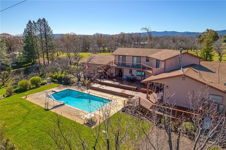 First time on market, custom built home. Located on Highland Springs Rd on almost an acre is this 4005 sqft home with 2 car garage as well as attached RV garage. Home has formal dining room, family room, living room, 4 large bedrooms and 3 bathrooms and office.  With a fireplace and wood burning stove along with 6 mini splits there are plenty of choices for comfort. Owned solar will keep the power bills manageable. The home has a well for water. There is also a backup generator in case of power outage. For outside comfort and entertaining, there is a newer updated multi level deck leading to a beautiful private pool with slide and diving board, overlooking Lakeport with views of Clearlake and vineyards. This is a must see home perfect for a large family or vacation home!!